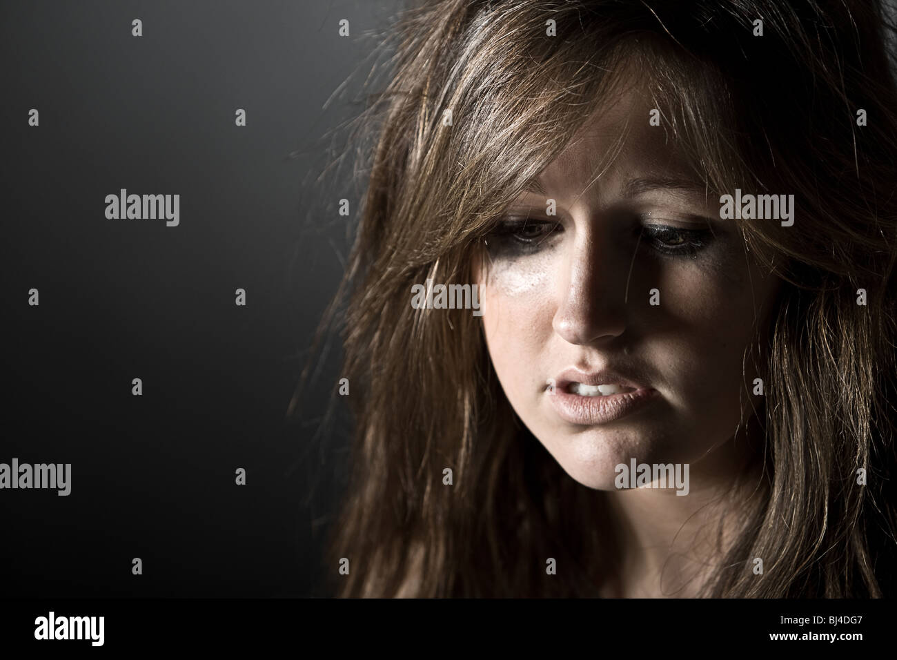 Powerful Low Key Shot of a Depressed Teenager Stock Photo Alamy