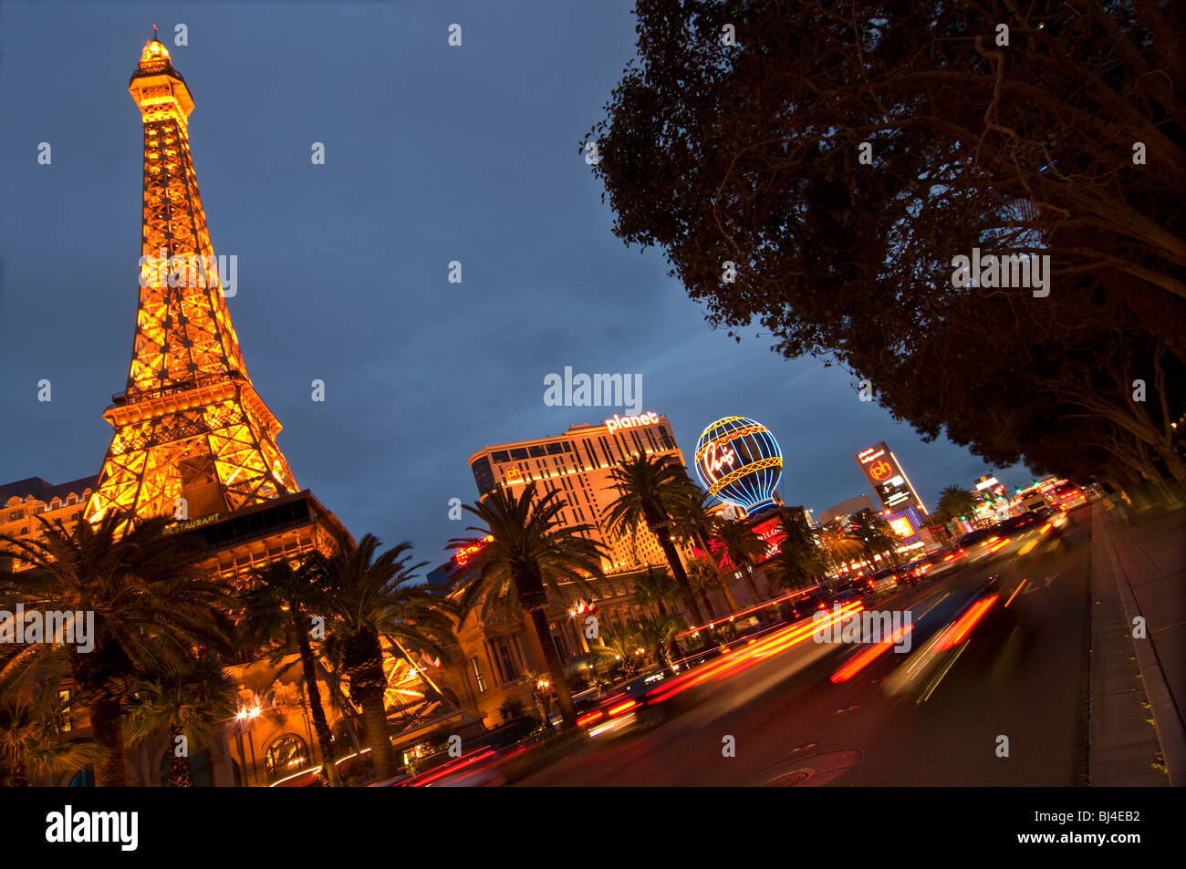 Twilight traffic on the Strip, near the Eiffel Tower, Las Vegas, Nevada Stock Photo