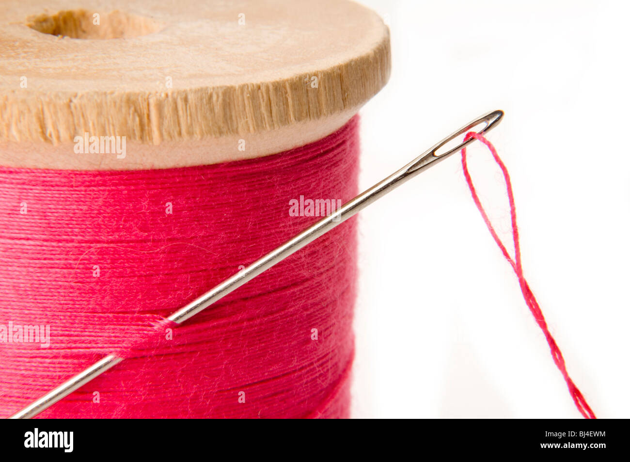 Threading needle thread hires stock photography and images Alamy