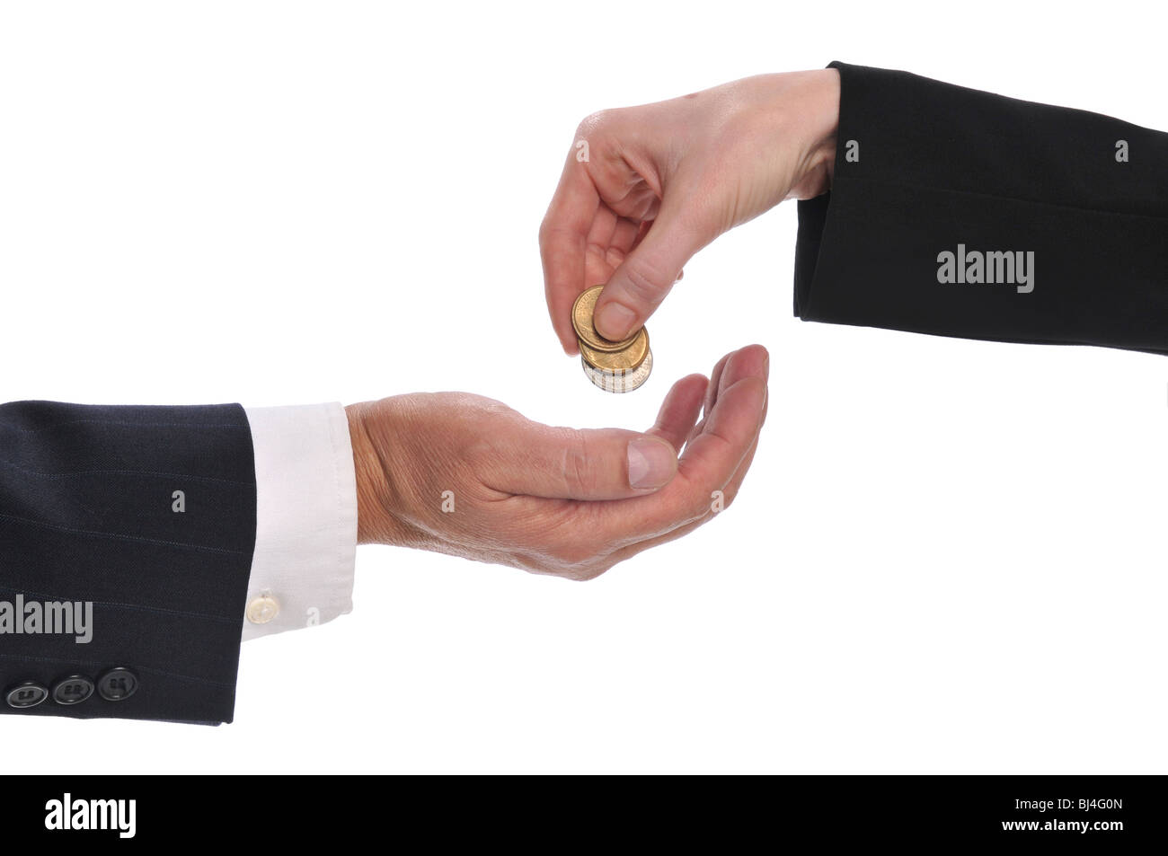 Woman's hand giving money to a businessman isolated on a white background Stock Photo