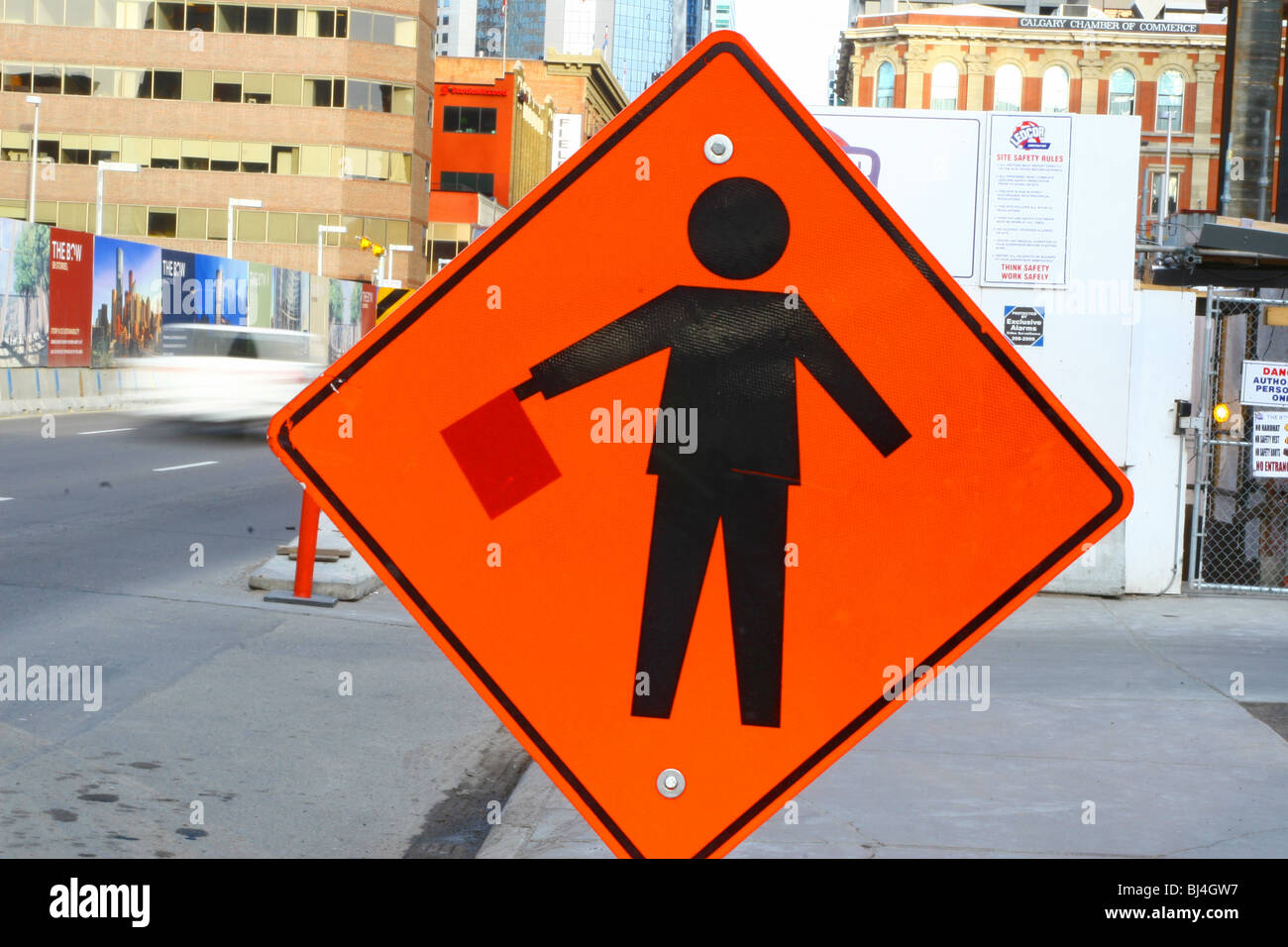 Flagman sign near a construction site Stock Photo Alamy
