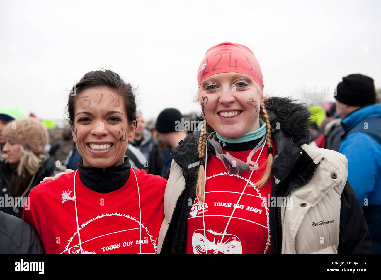 Two female participants in fun sporting event Stock Photo