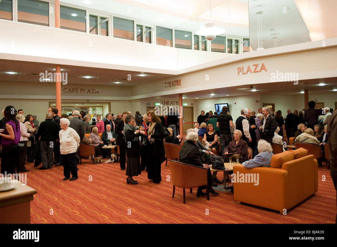 Floral Pavilion theatre foyer with crowds of patrons Stock Photo