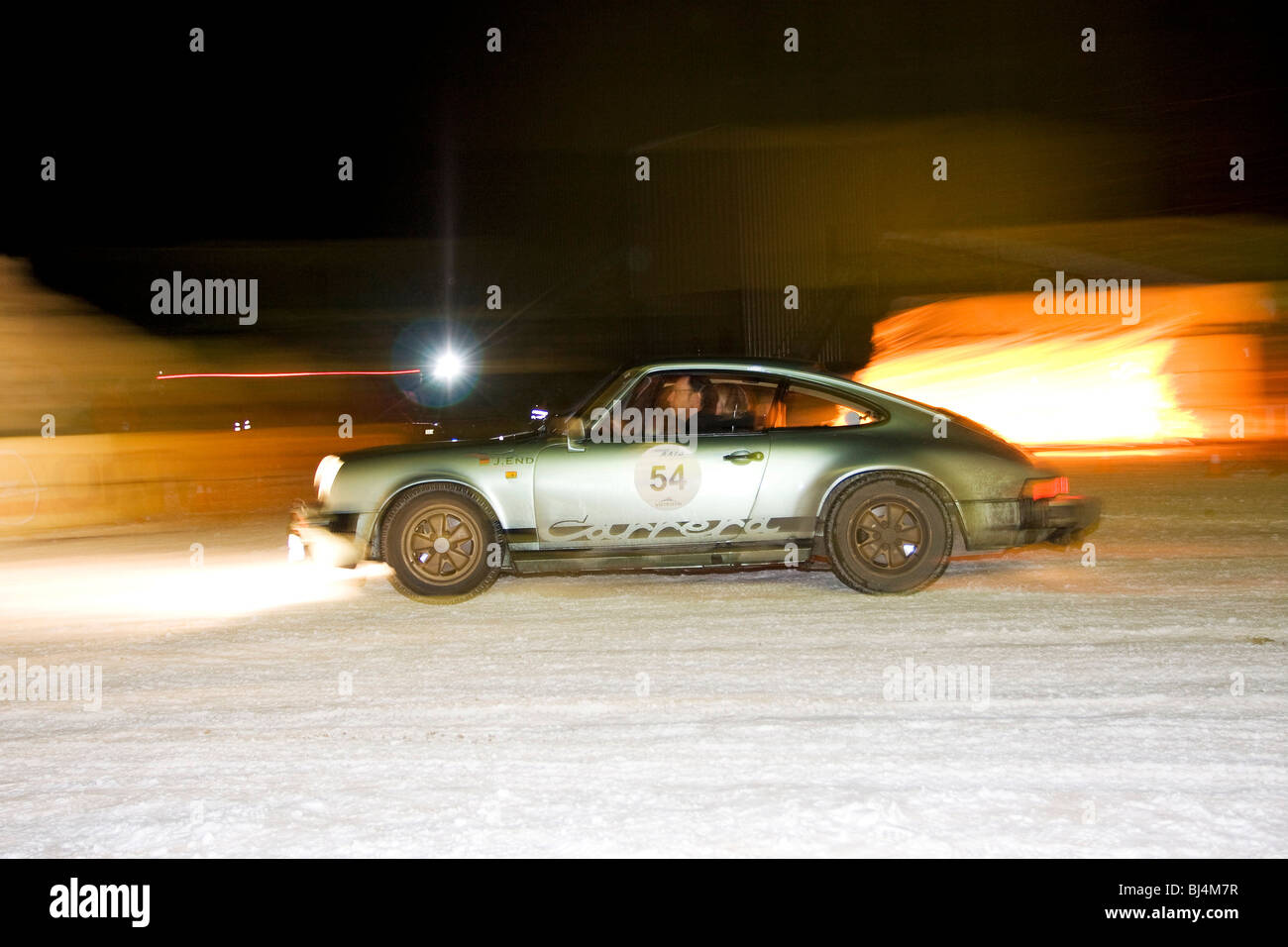 Porsche 911 Carrera , built in 1977, night race, Winter Raid 2010  classic car rally, Switzerland Stock Photo - Alamy