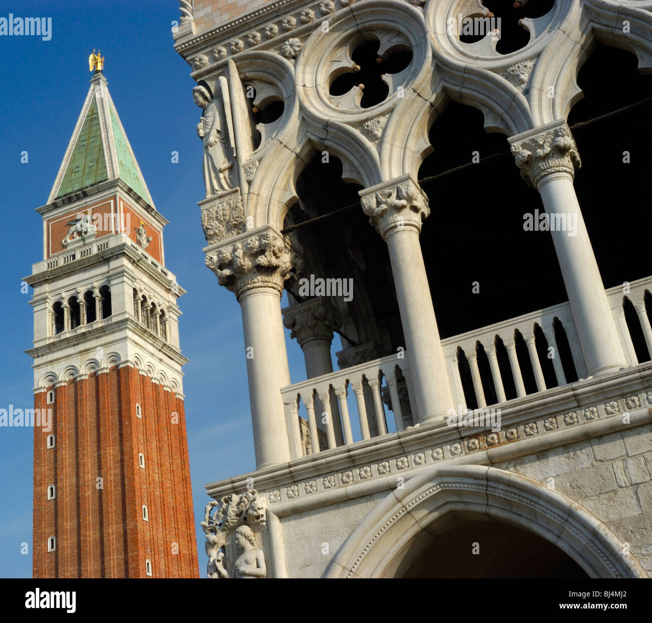 Venice, Veneto, Italy. The Campanile (bell tower) and Doges' Palace (Palazzo Ducale) in Saint Mark's (San Marco) Stock Photo