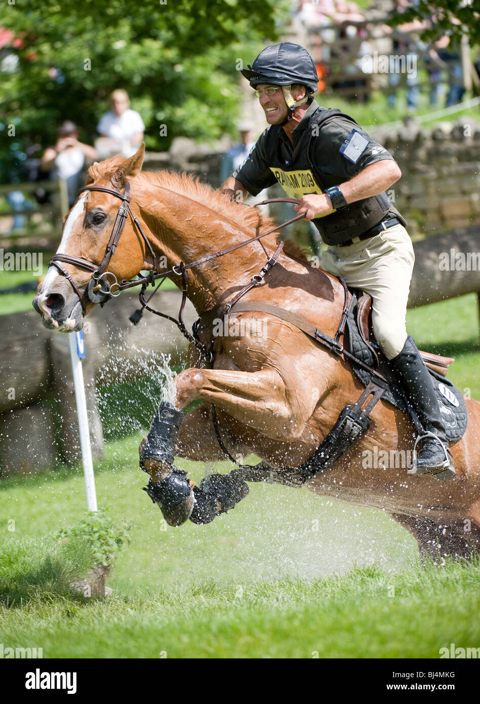 New Zealand Jockey Andrew  Nicholson exits the water complex At  Bramham Horse trials 2009 on his Horse  Nereo Stock Photo