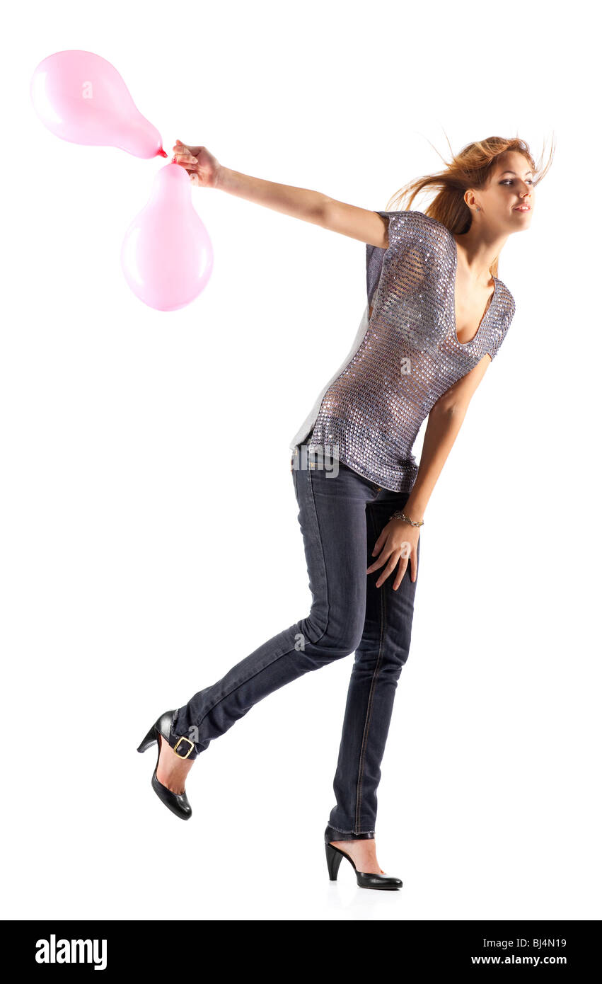 Young slim woman with balloons. Isolated on white. Stock Photo