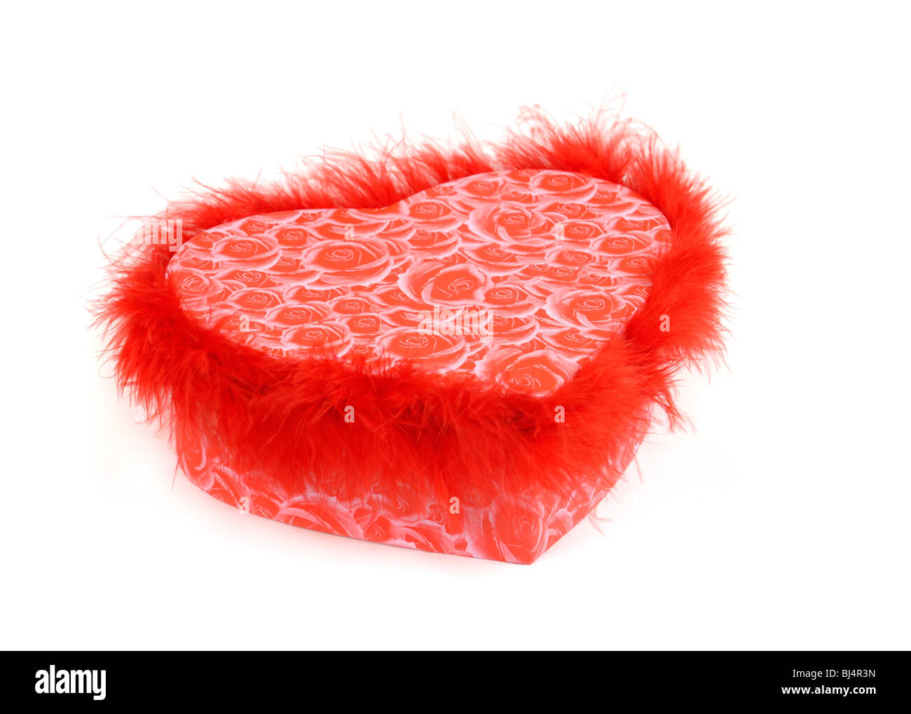 Lovely heart-shaped red fancy box isolated silhouette on white background. Valentine's Day gift concept Stock Photo