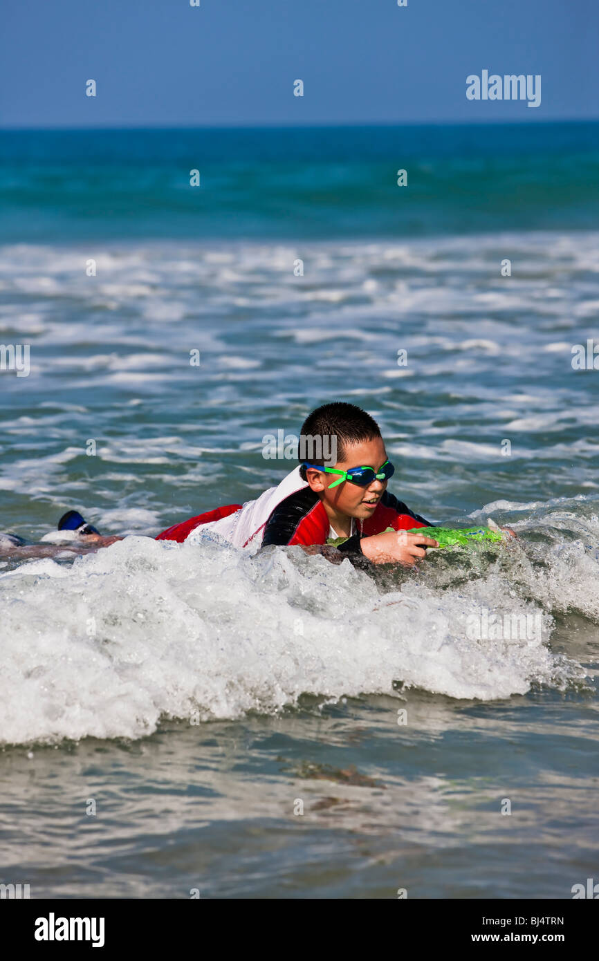 Boogie boarding in Hawaii Stock Photo Alamy