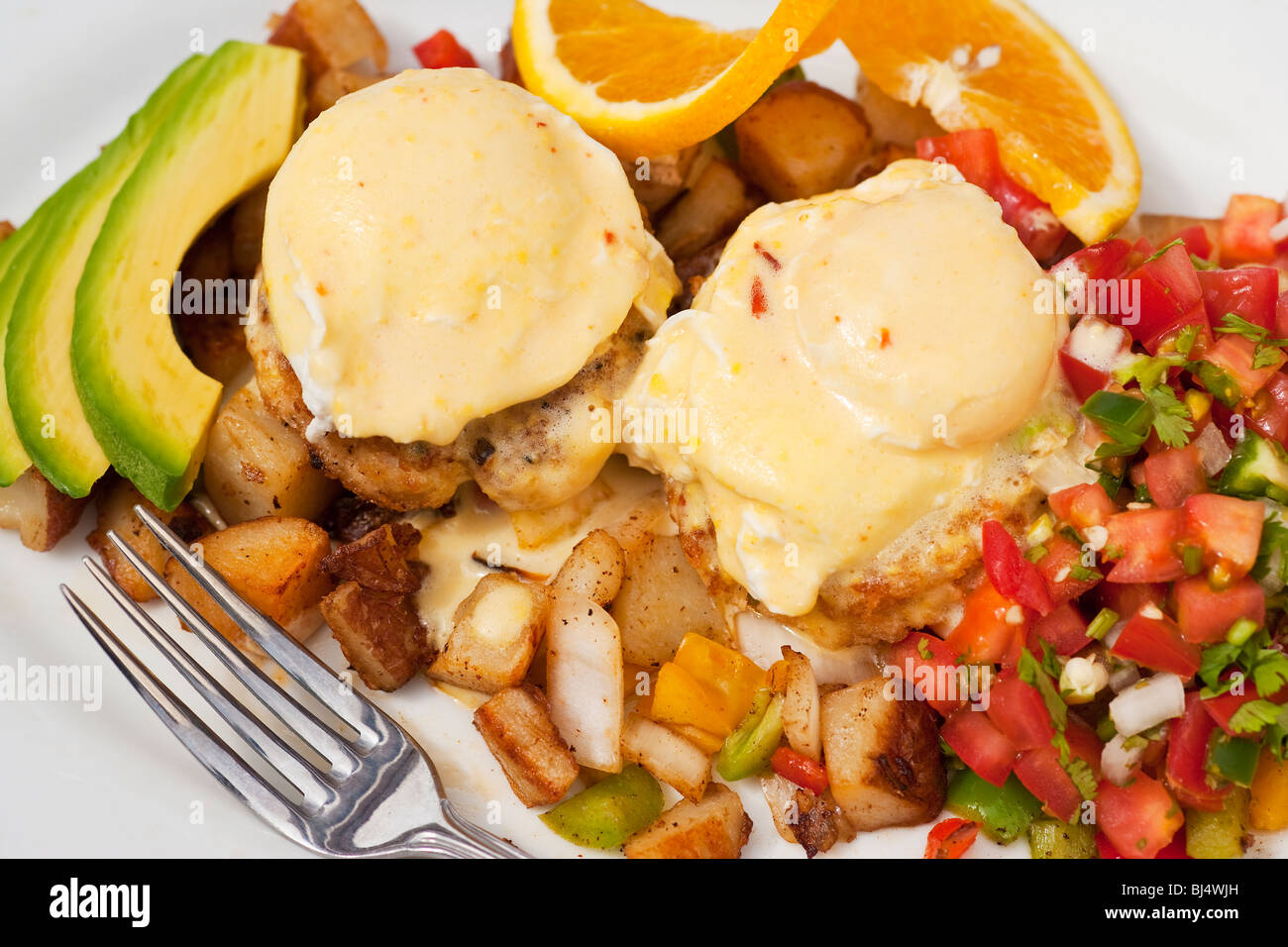 poached eggs, Dungeness crab cakes, chipotle Hollandaise sauce, roasted