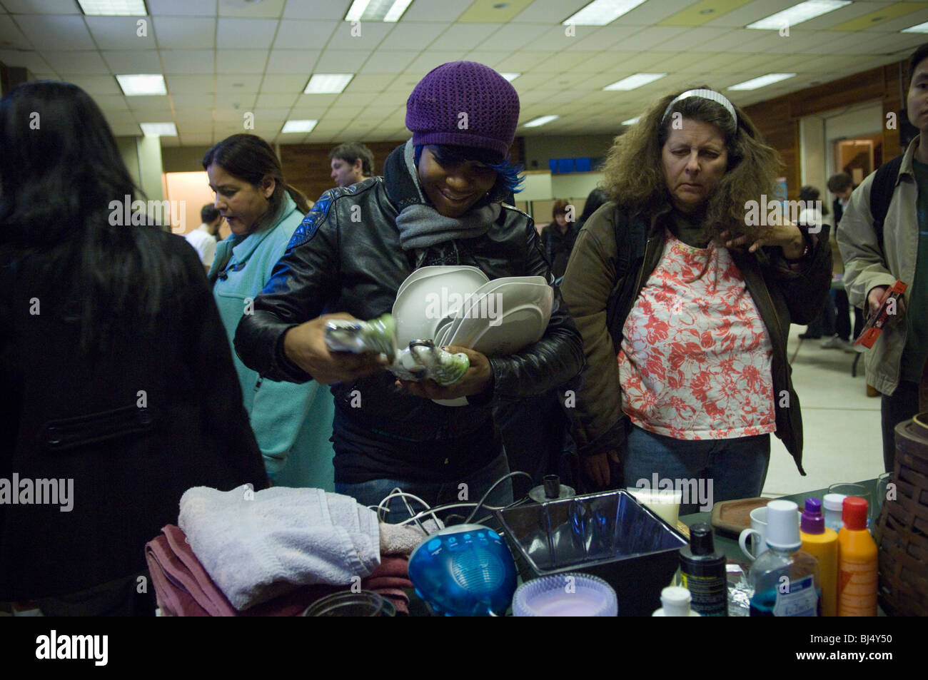 Thrifty shoppers at a free Stop 'N' Swap event in the Jackson Heights neighborhood of Queens in NY Stock Photo