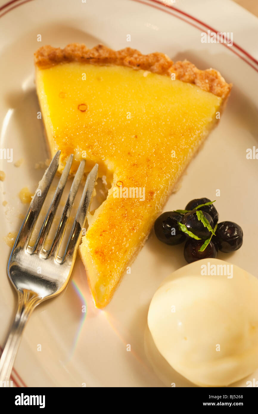 lemon tart with macadamia nut crust, Cafe, Santa Barbara, California, United States of America Stock Photo