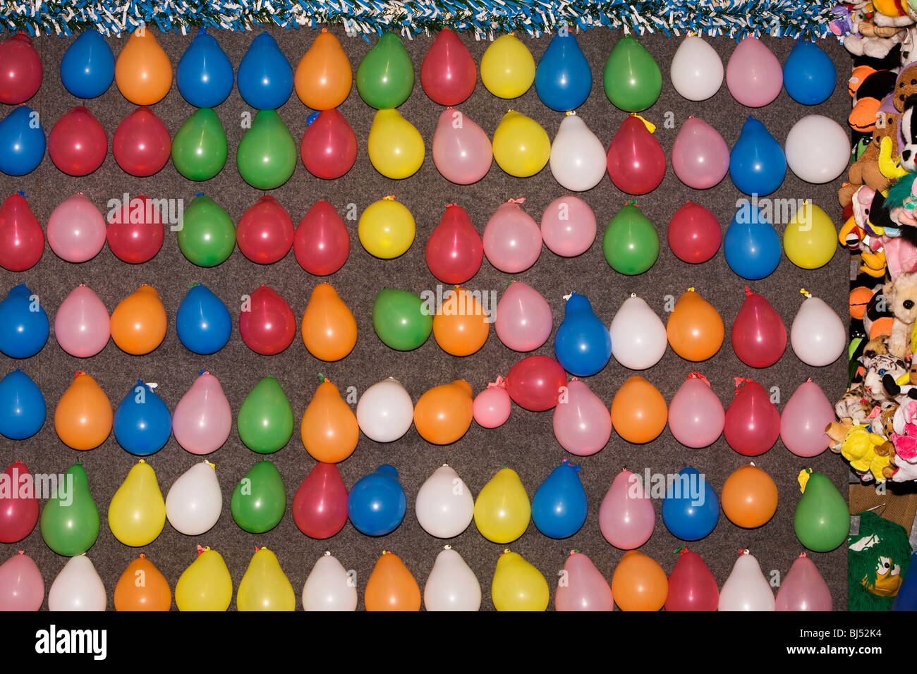 Balloons in a shooting gallery Stock Photo