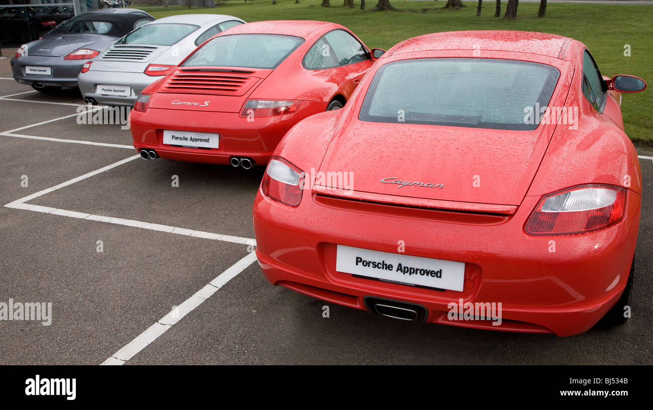 New Porsche cars sales forecourt Stock Photo Alamy