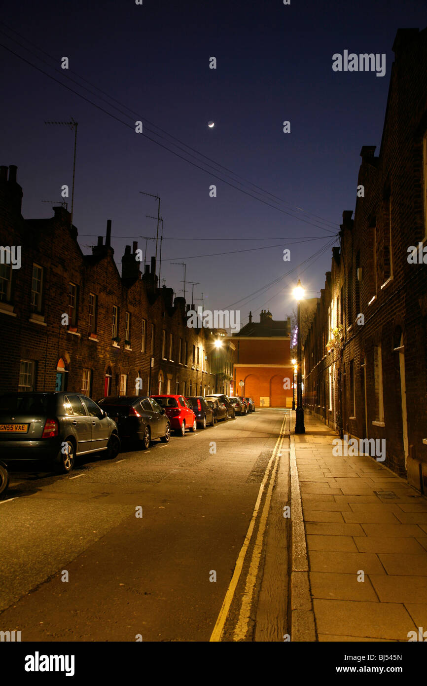 Crescent moon shining above Roupell Street, Waterloo, London, UK Stock Photo