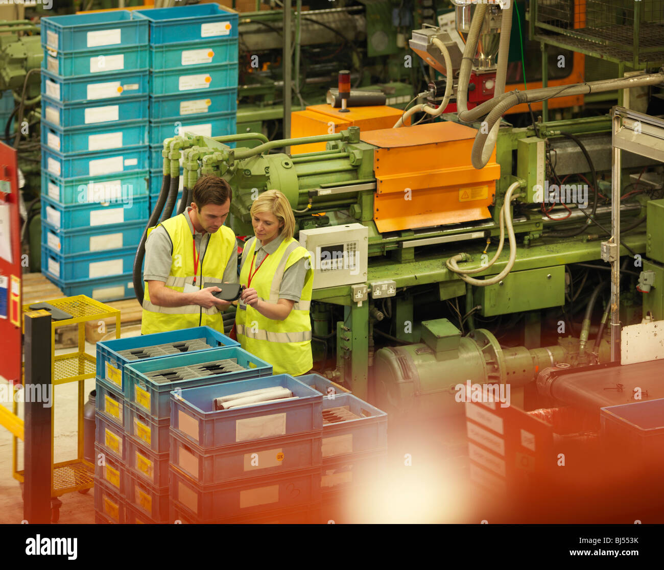 Factory Workers On Factory Floor Stock Photo Alamy
