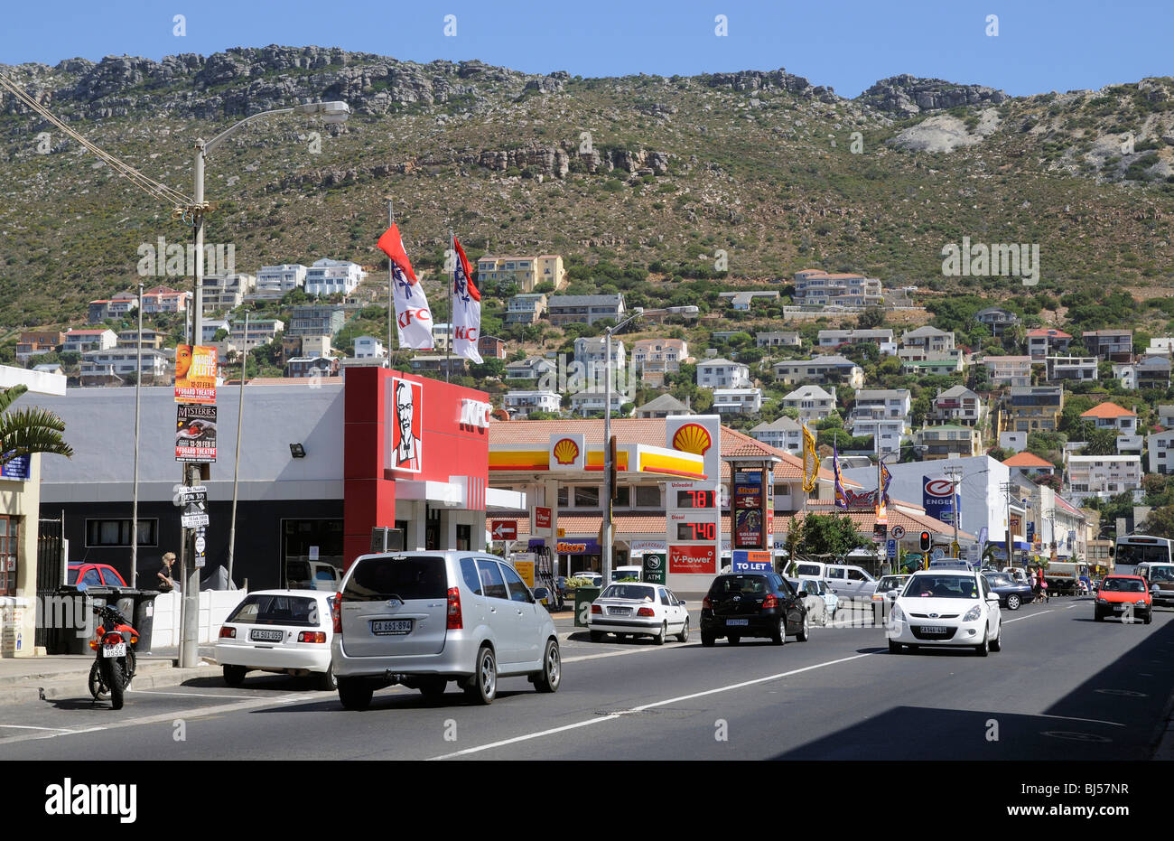 Fish Hoek a seaside resort town close to Cape Town South Africa with  housing on the mountainside overlooking the town centre Stock Photo - Alamy