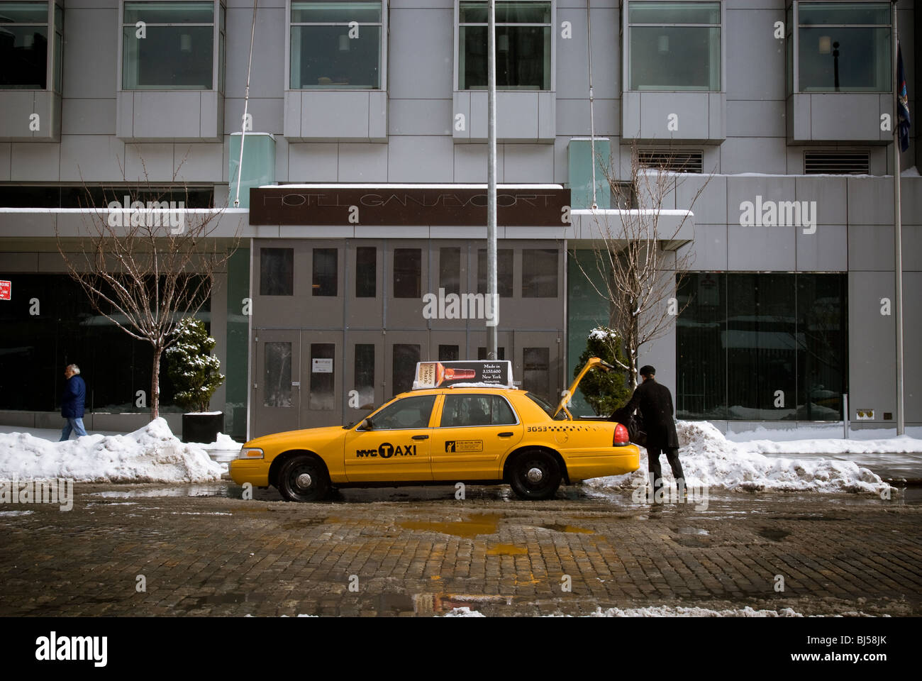 Taxis at work in front of the Hotel Gansevoort in the trendy Meatpacking District in New York Stock Photo