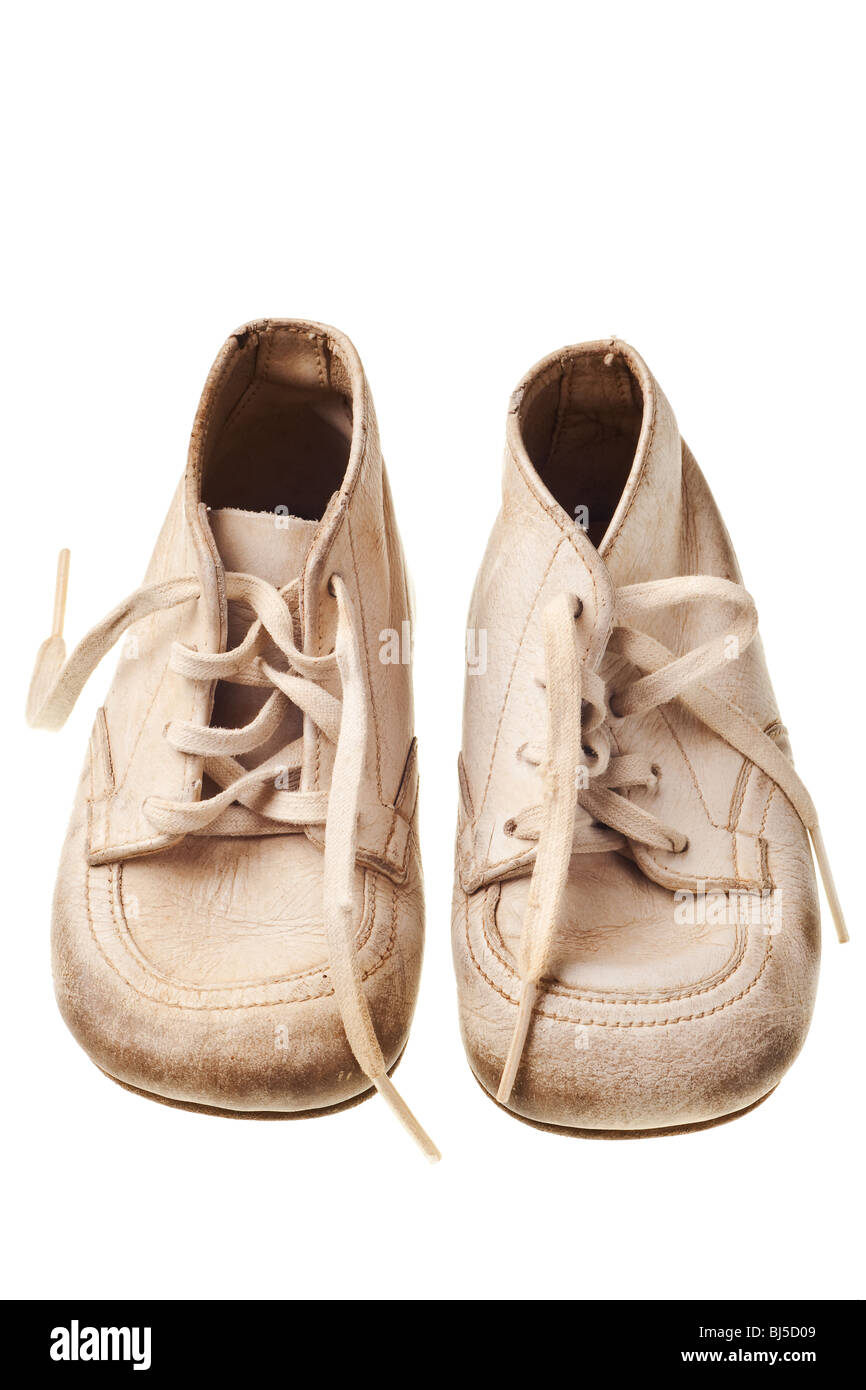 old baby shoes isolated on white background Stock Photo - Alamy
