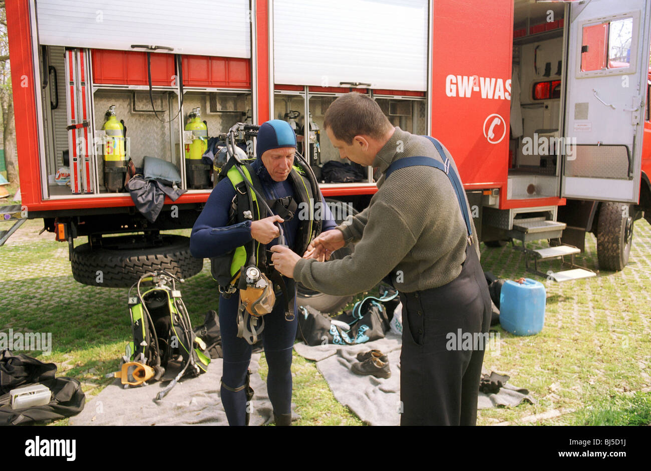 Fire brigade diver preparing for rescue exercises, Germany Stock Photo