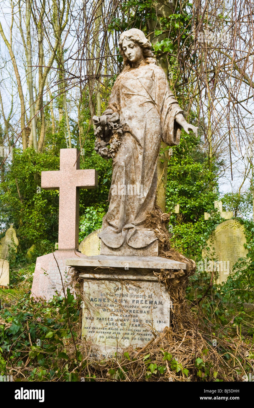 Highgate Cemetery , one 6 original private cemeteries around London , first used 1860 , tomb Agnes Amy Freeman Angel with wreath Stock Photo