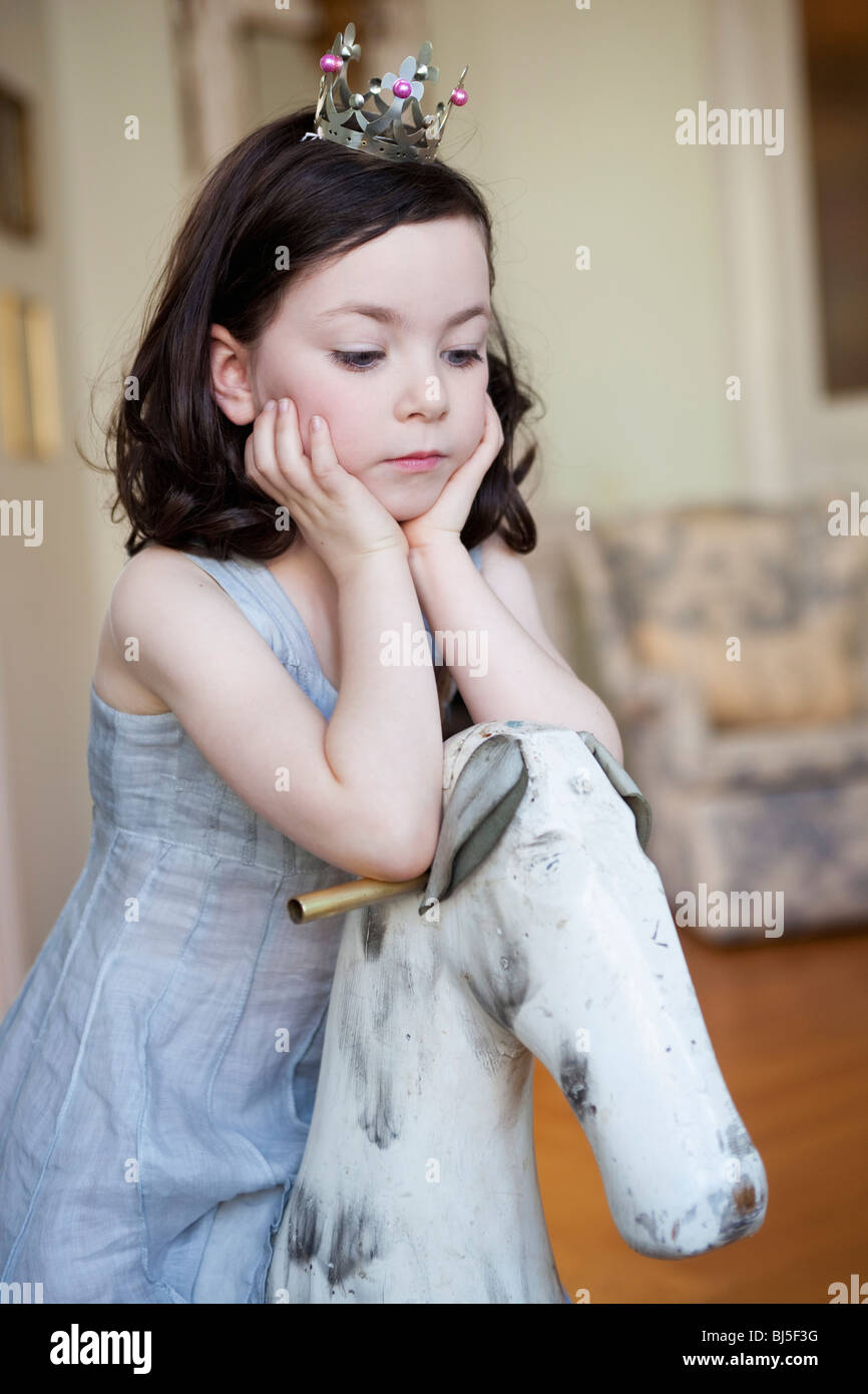 girl resting her head on her hands Stock Photo - Alamy