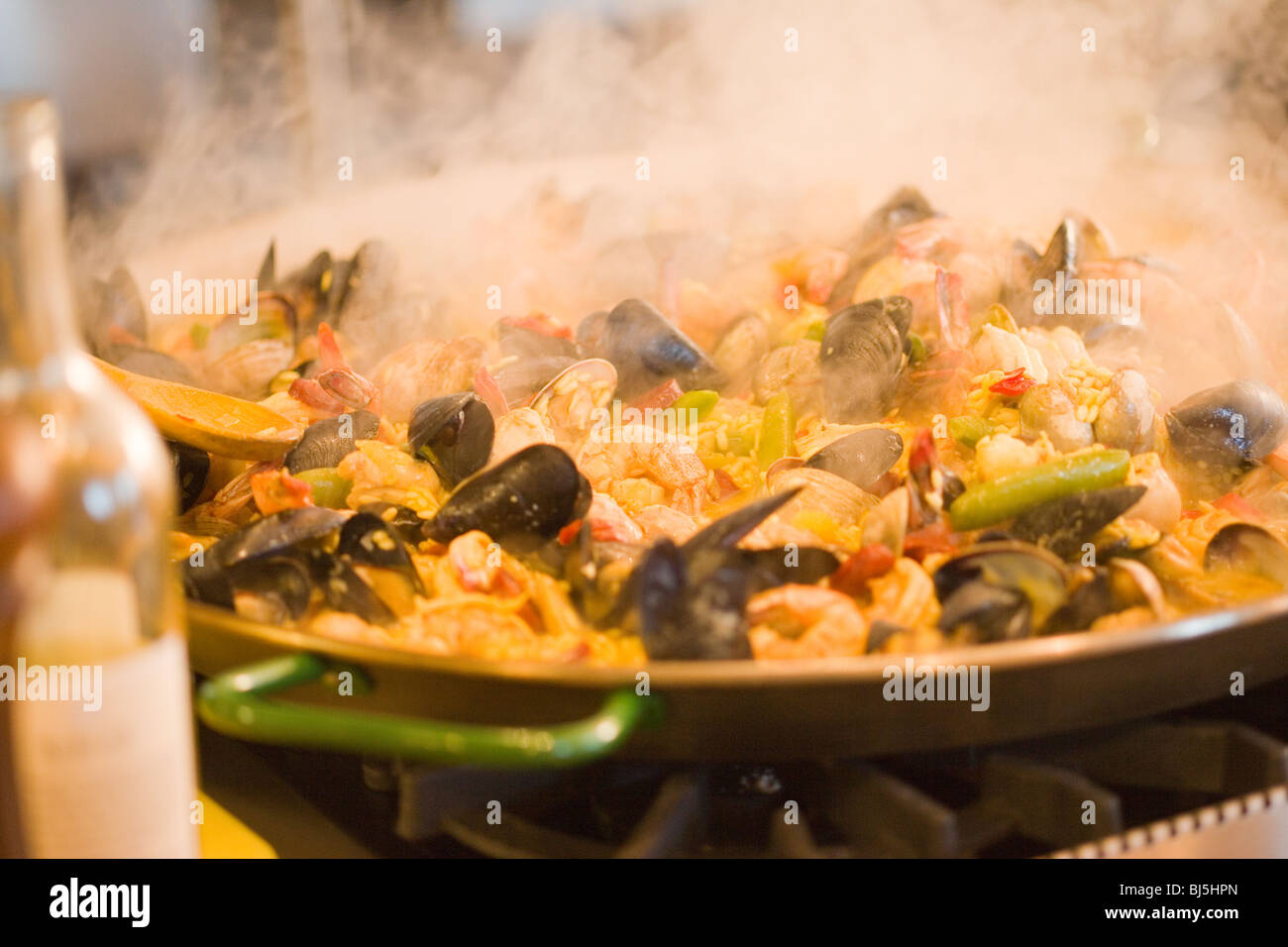 chef Mancuso prepares a traditional Spanish dish of paella at a cooking class at Roblar Winery, Santa Ynez Valley, California Stock Photo