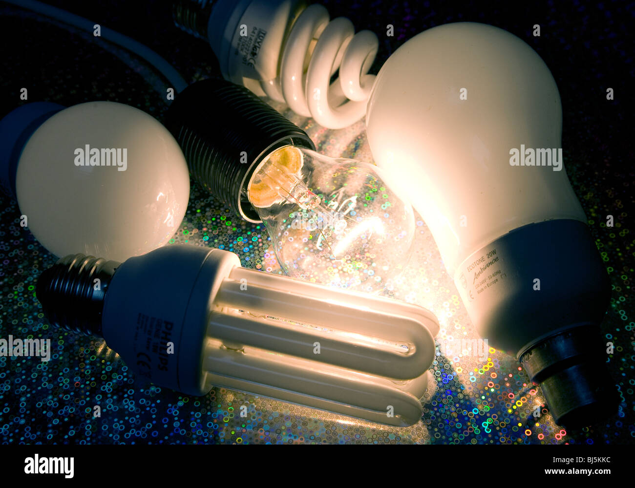 Tungsten bulb with energy saving types Stock Photo Alamy