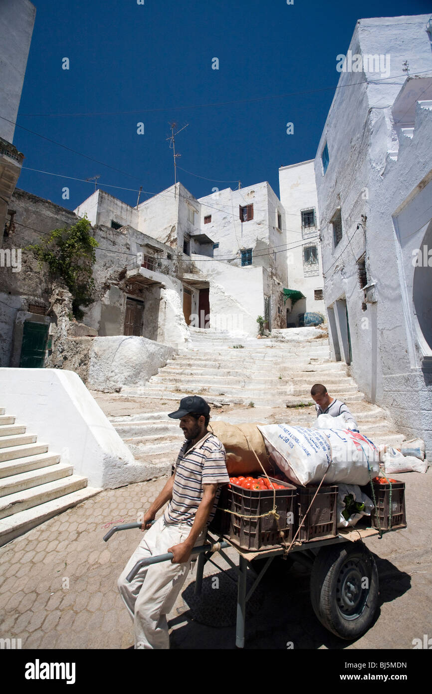 Vegetables vendor with a handcart on his way to Souk, Tetouan, Marocc Stock Photo
