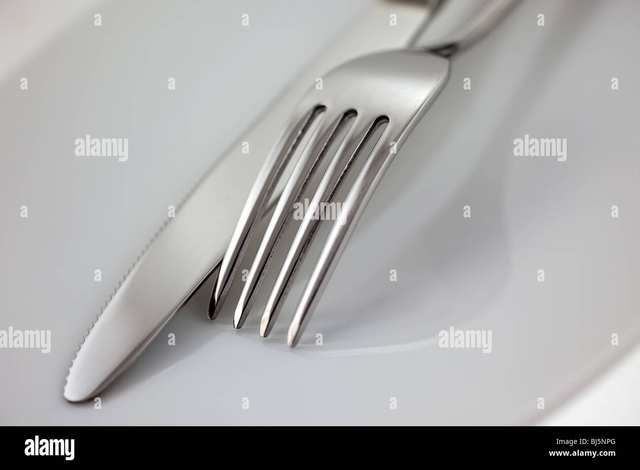 steel flatware fork and knife closeup. small GRIP Stock Photo Alamy