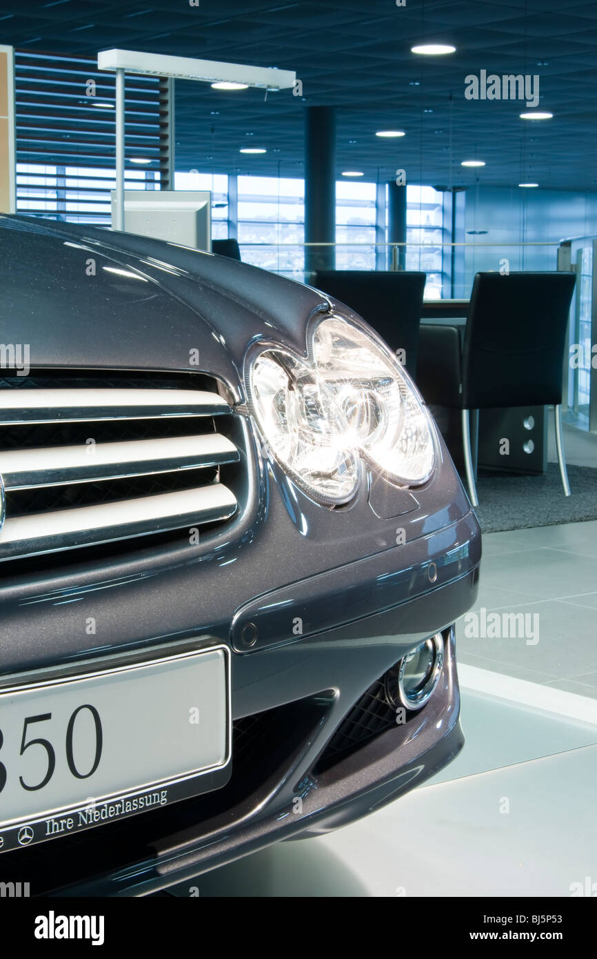 mercedes benz car at cars dealership showroom, front side view Stock