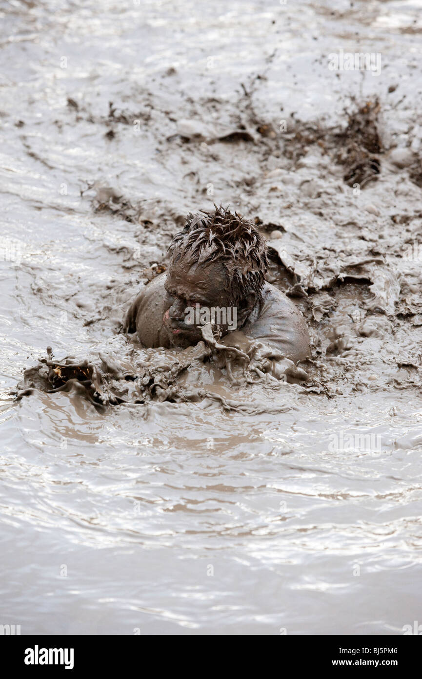 Swimming in very muddy water up to neck Stock Photo Alamy