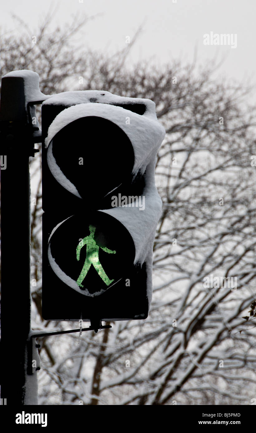 Pedestrian traffic light in the snow in London Stock Photo