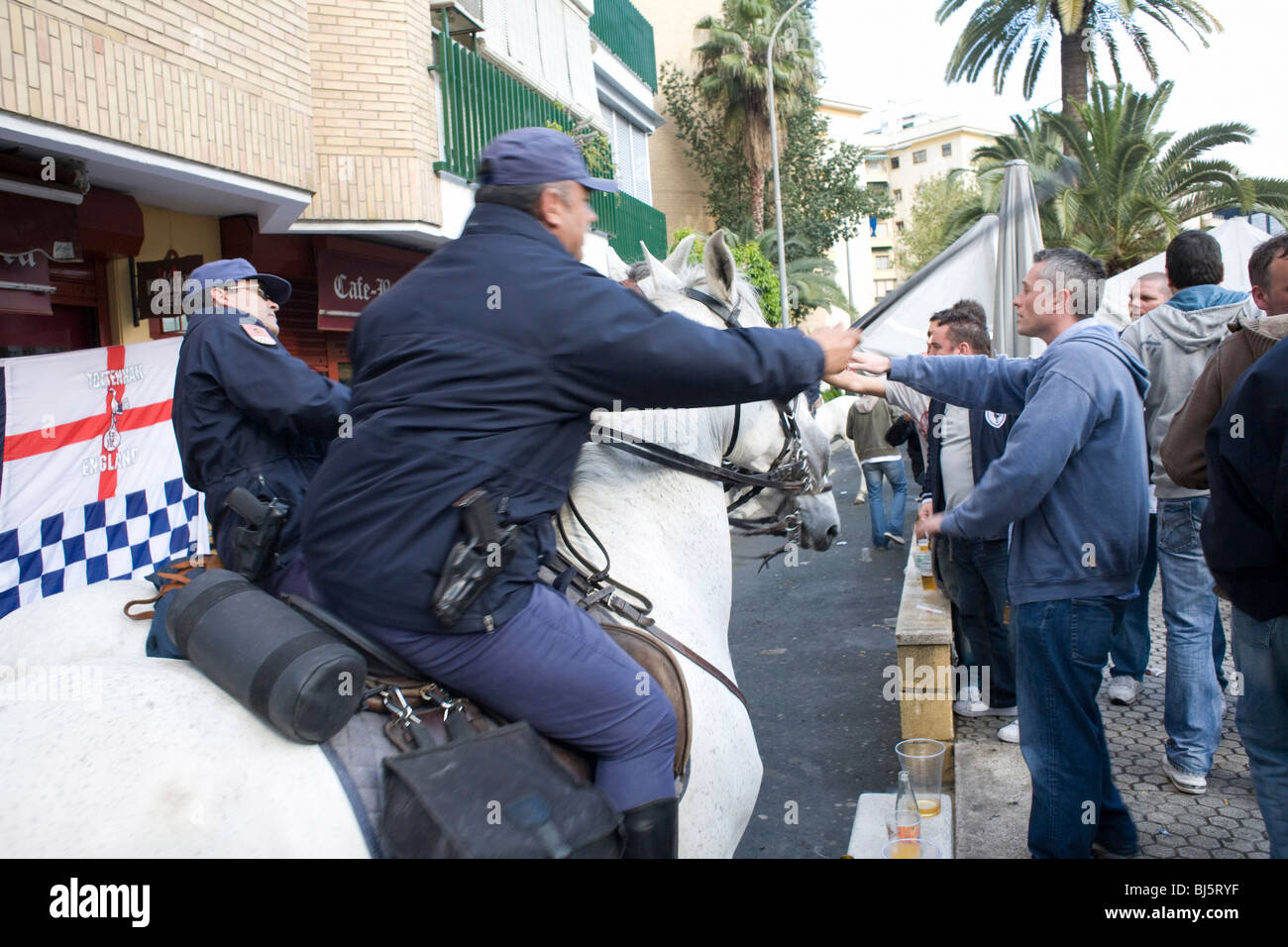 Mounted policemen in front of Ramon Sanchez Pizjuan Stadium, Seville, Spain Stock Photo