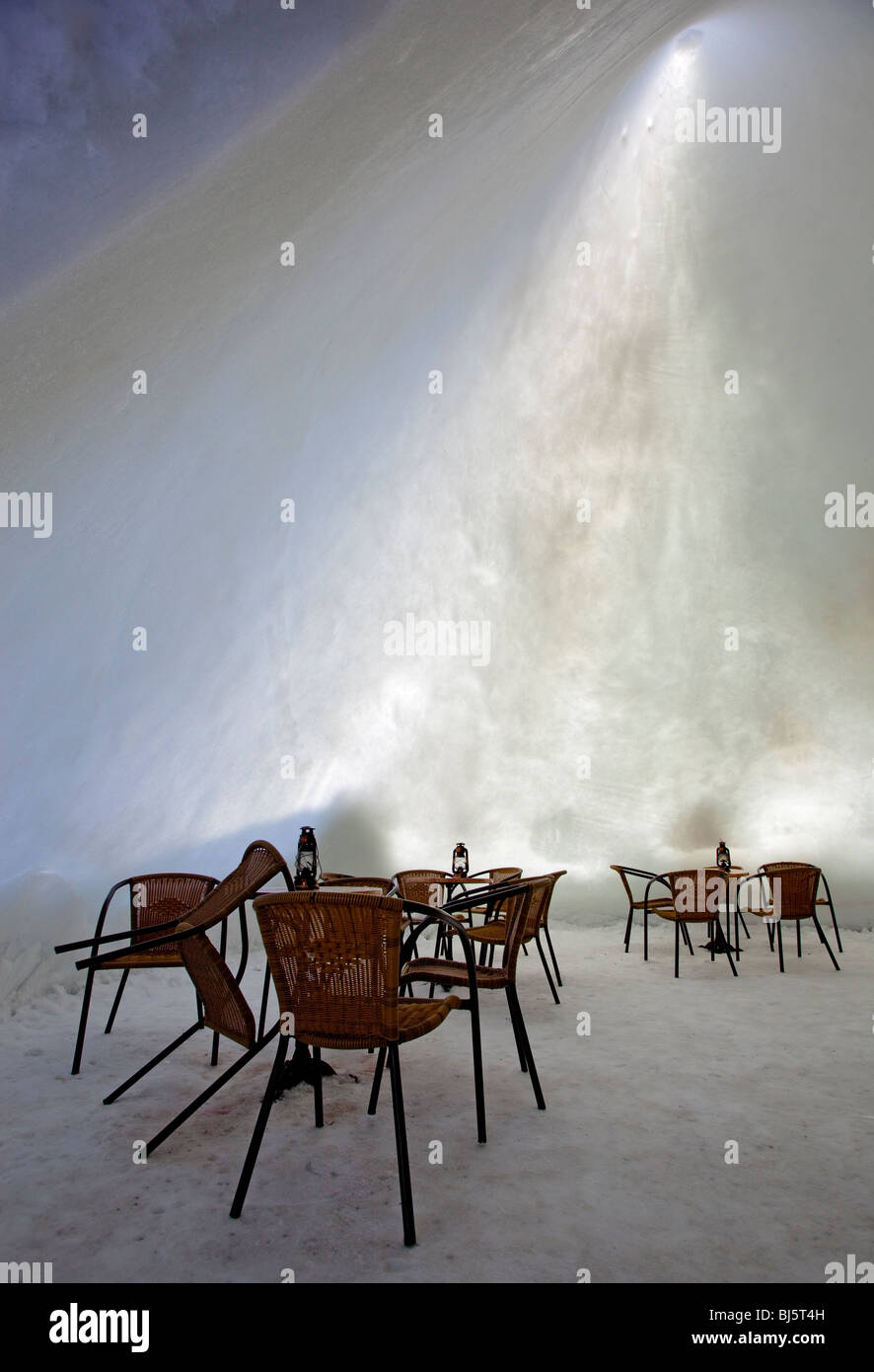 The interior of a snow cafe made of compacted snow and ice in Finland ...