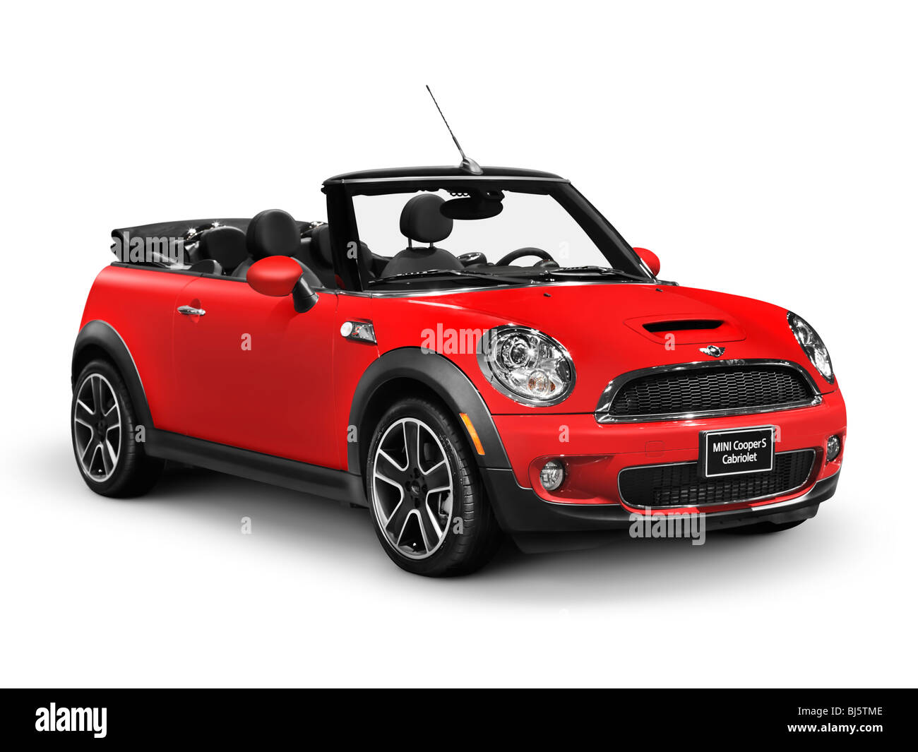 License available at MaximImages.com - Red 2010 Mini Cooper S Convertible car isolated on white background with clipping path Stock Photo