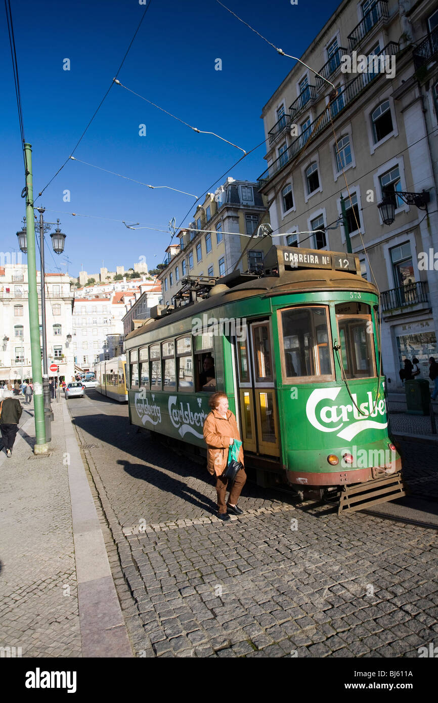 An old tram on Praca da Figueira Street, Lisbon, Portugal Stock Photo