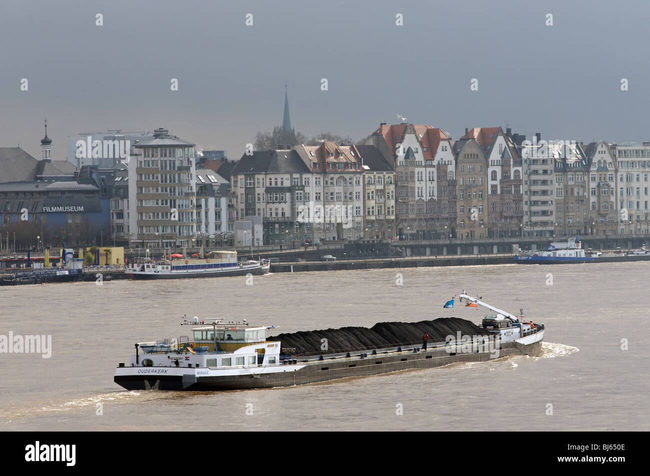 Coal transported by barge, Dusseldorf, Germany. Stock Photo