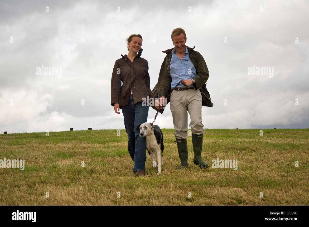 Married couple walking and enjoying their country lifestyle, Cumbria, uk Stock Photo