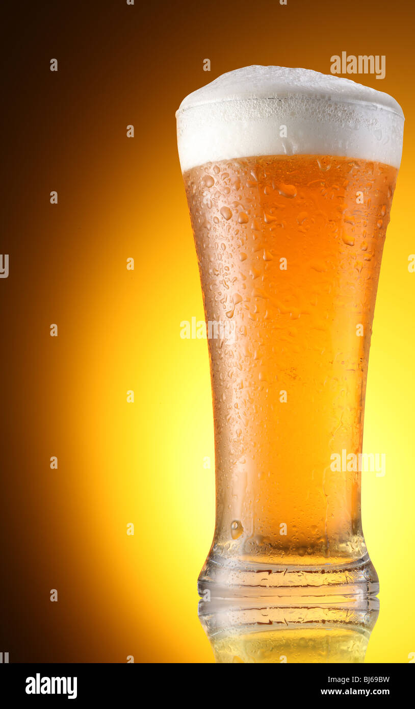 glass of beer on a brown background Stock Photo