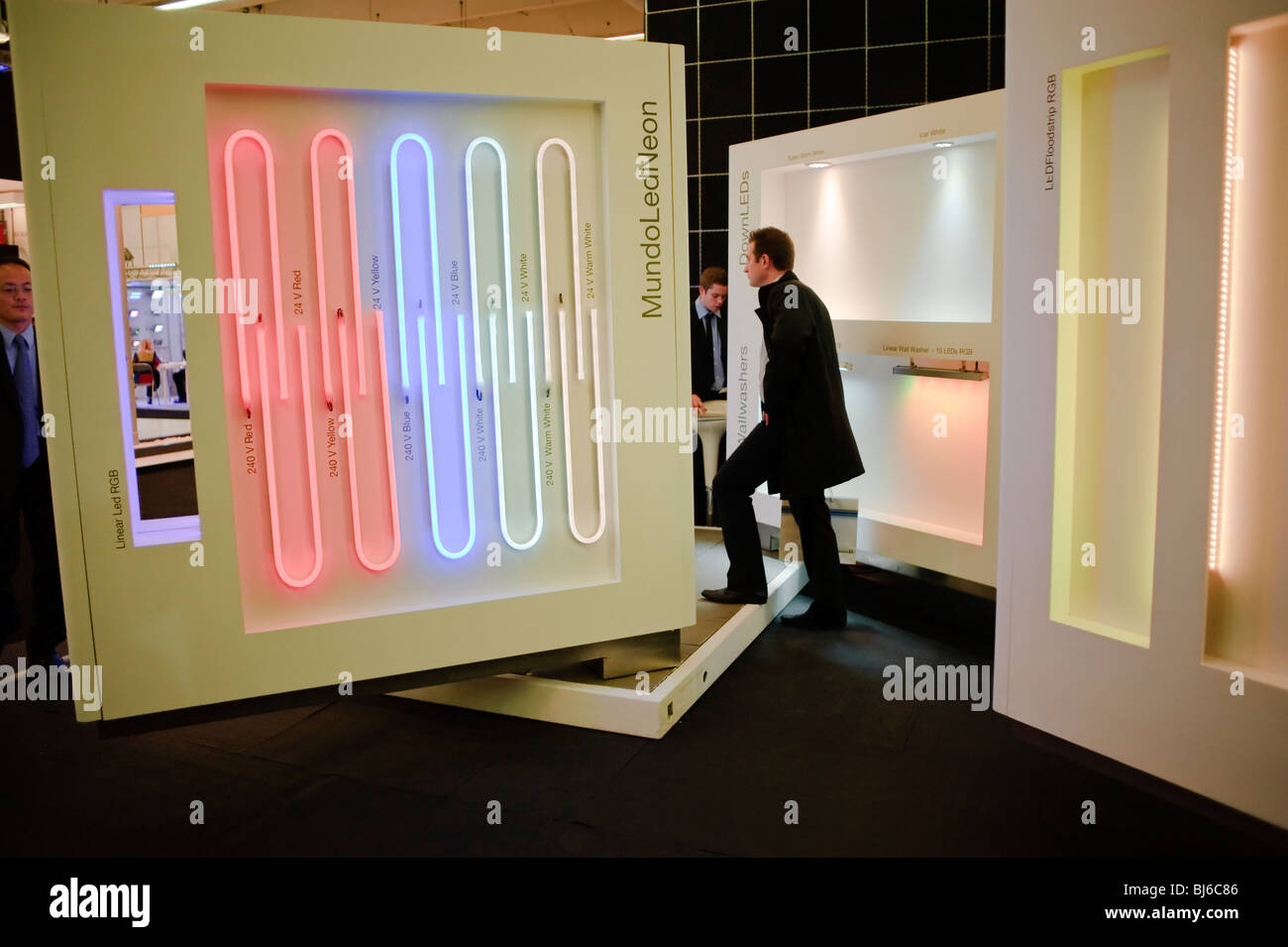 Paris, France, Man Visiting, Construction Equipment Trade Show, LED Lighting Company Display, Stock Photo