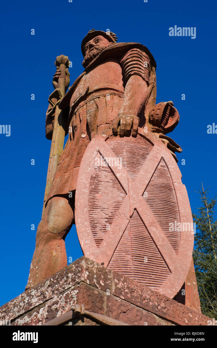 The Wallace Monument or statue at Dryburgh in the Scottish Borders - a dramatic pink sandstone statue of William Wallace Stock Photo
