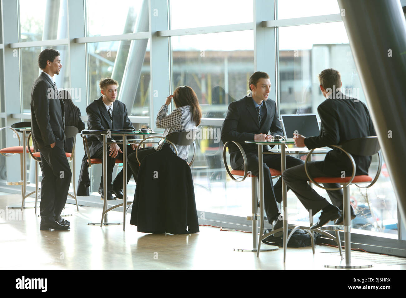 Lobby with business people meeting Stock Photo