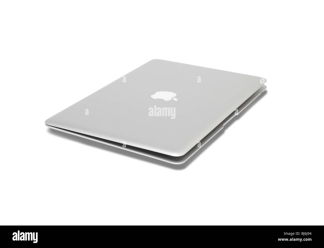 Macbook Air ultra slim and portable laptop computer on white background with shadow and clipping path Stock Photo