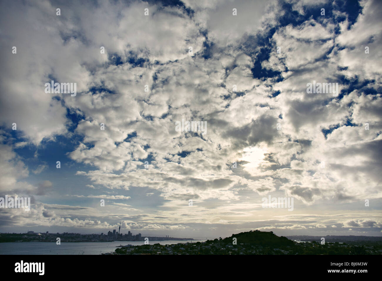 Auckland city skyline, New Zealand, North Island, with cloudy sky Stock Photo