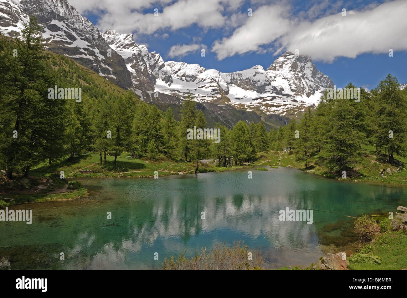 Il Lago Blu or the Blue Lake in Valtournenche Italy with the peak of the Matterhorn or Il Cervino in the background Stock Photo