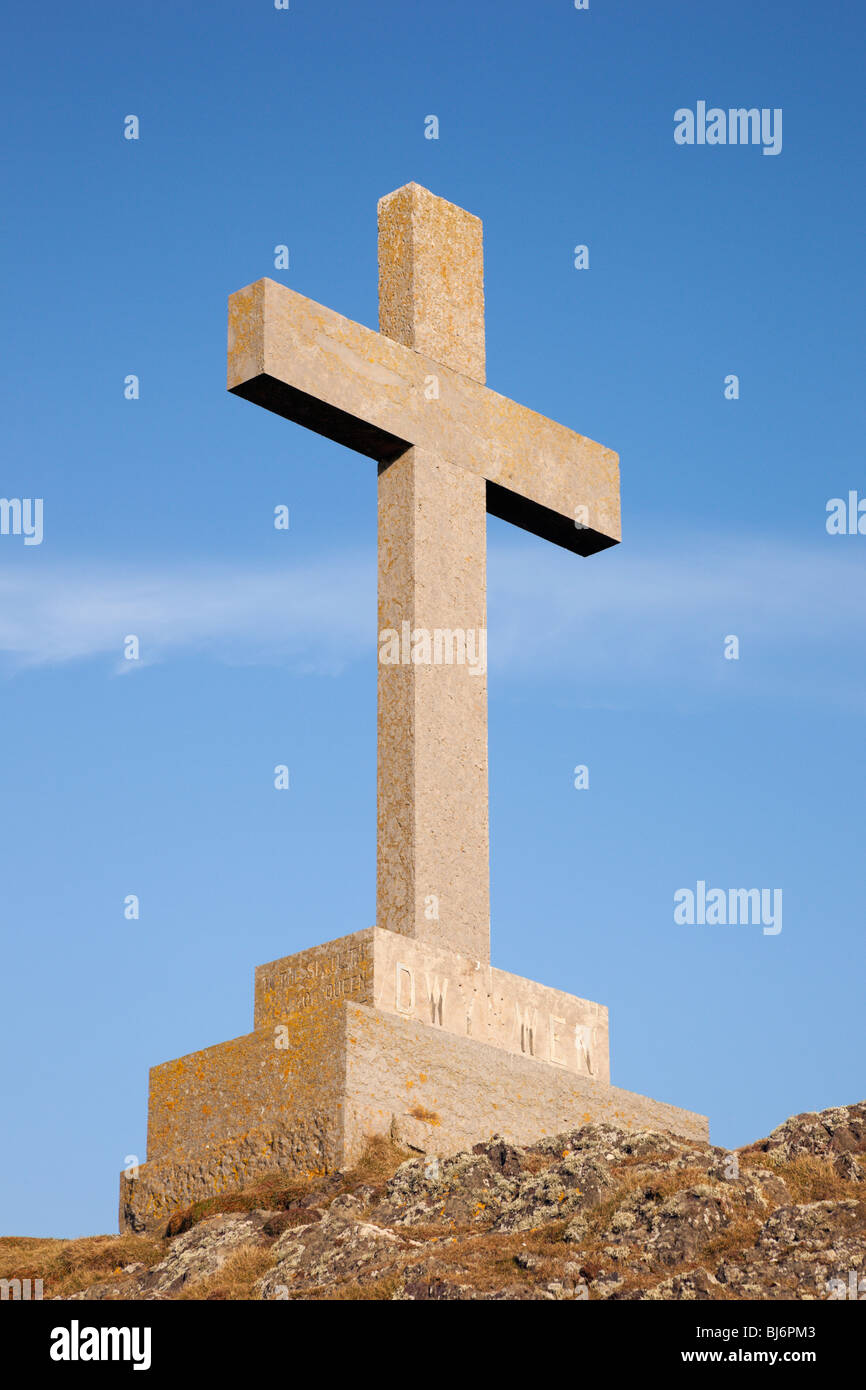 Stone cross of St Dwynwen Welsh patron saint of lovers. Llanddwyn Island, Newborough, Isle of Anglesey, North Wales, UK, Britan Stock Photo