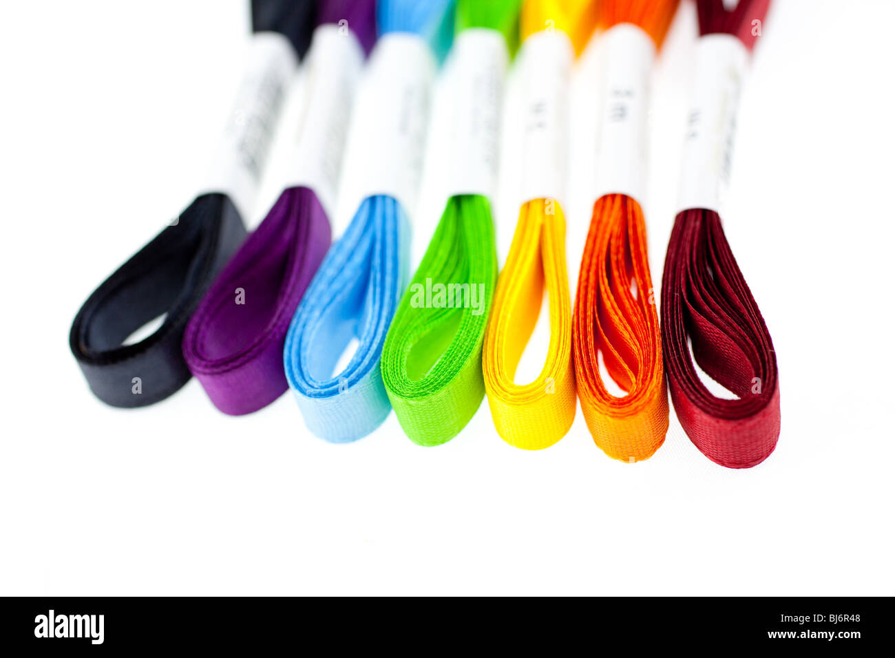 seven rainbow colored ribbons on white background Stock Photo - Alamy