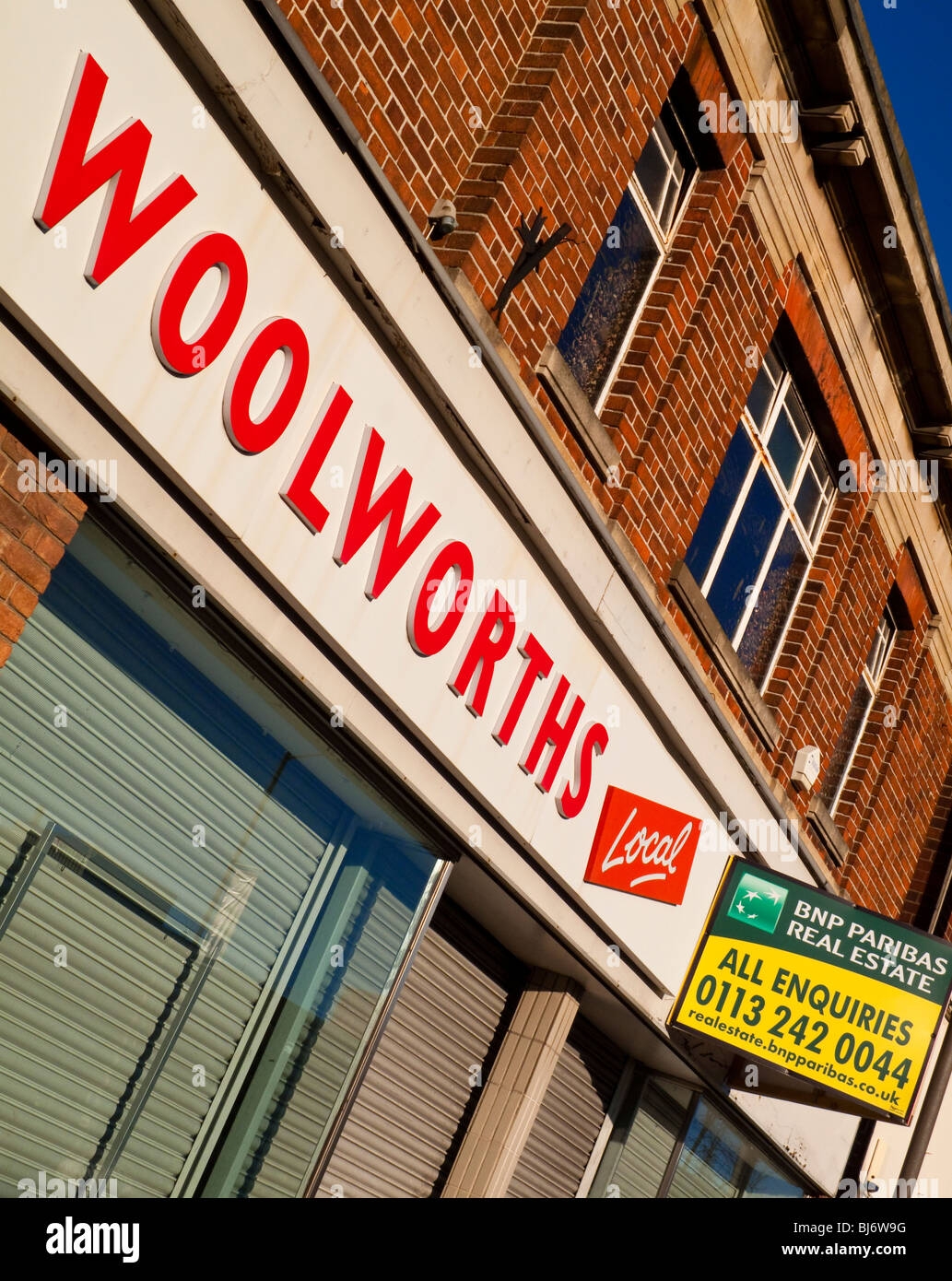 Closed branch of Woolworths empty since the collapse of the company in early 2009 due to the UK credit crunch and recession Stock Photo