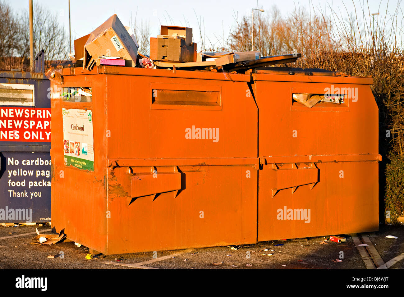 Overflowing recycling bins Stock Photo